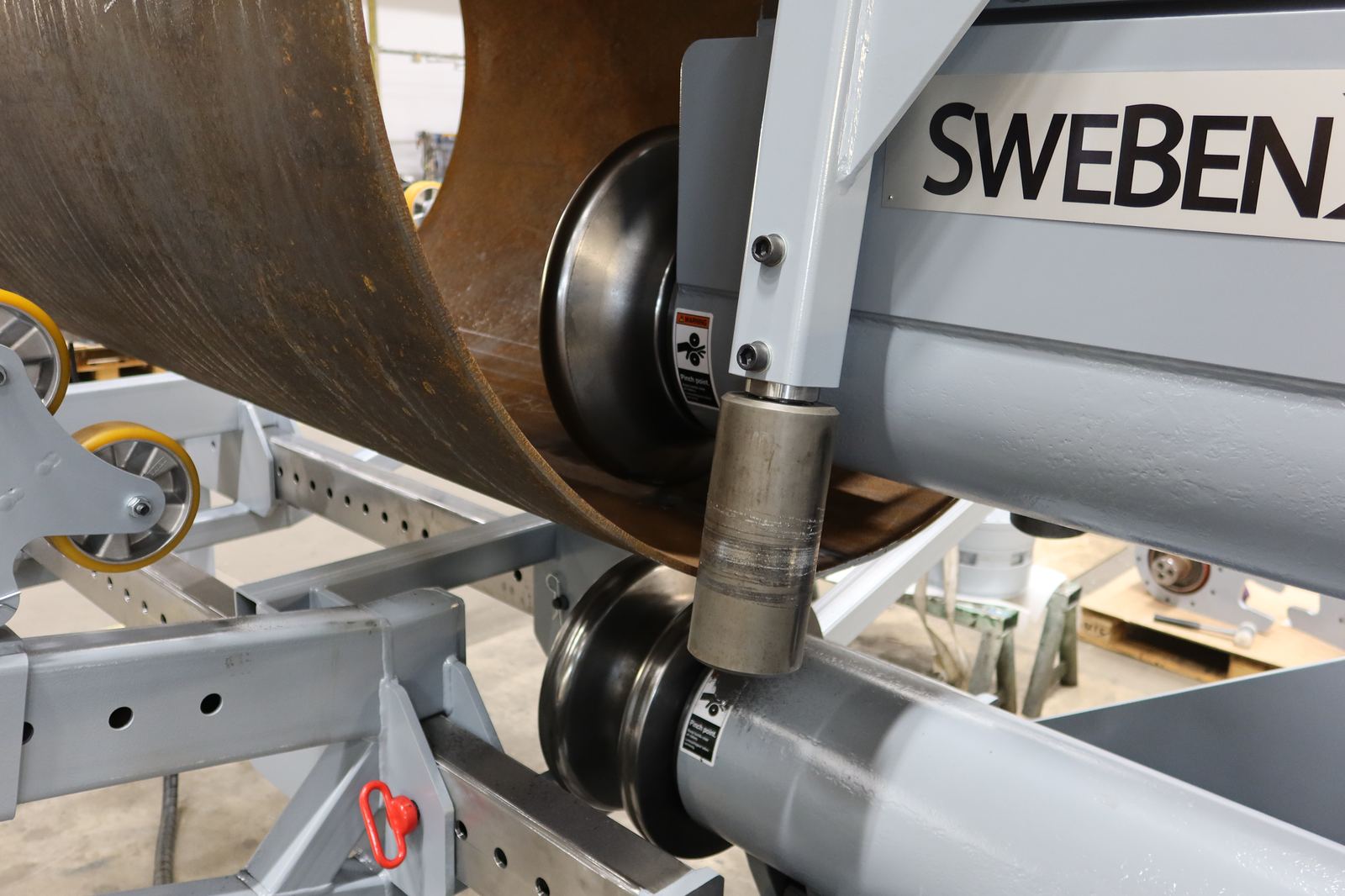Profiled Forming Rolls – SweBend JM-140 Joggling Machine SweBend JM-140 joggling machine profiled forming rolls pressing a groove into a heavy-wall steel cylinder