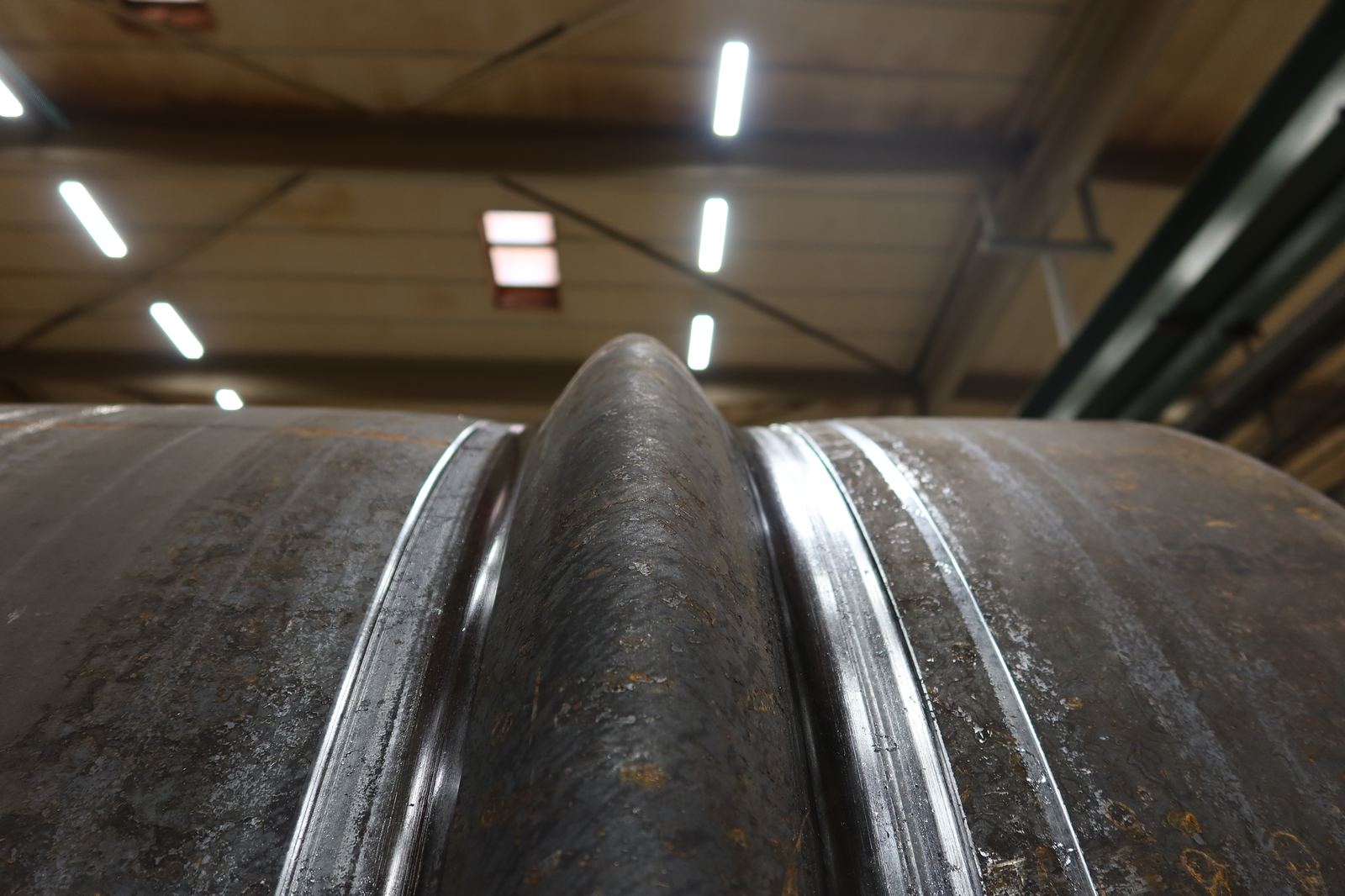 Rolled Stiffening Grooves – SweBend JM-140 Close-up of circumferential stiffening grooves joggled into a steel cylinder on the SweBend JM-140
